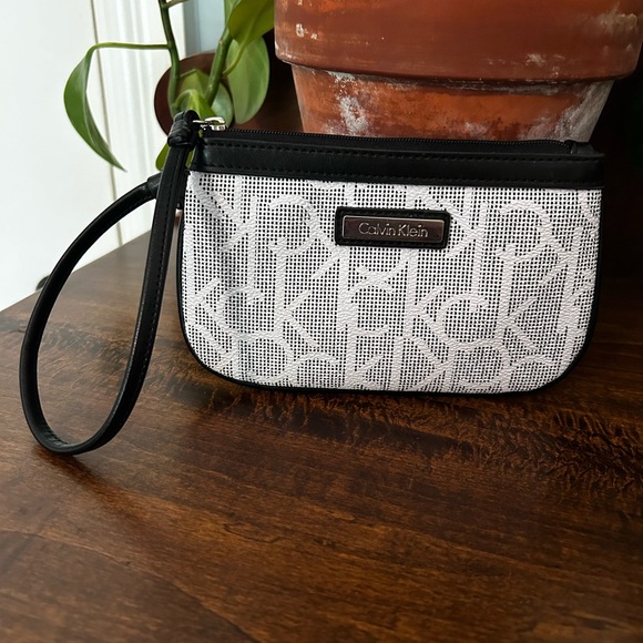 Calvin Klein Handbags - Calvin Klein Black and White Monogram Wrislet